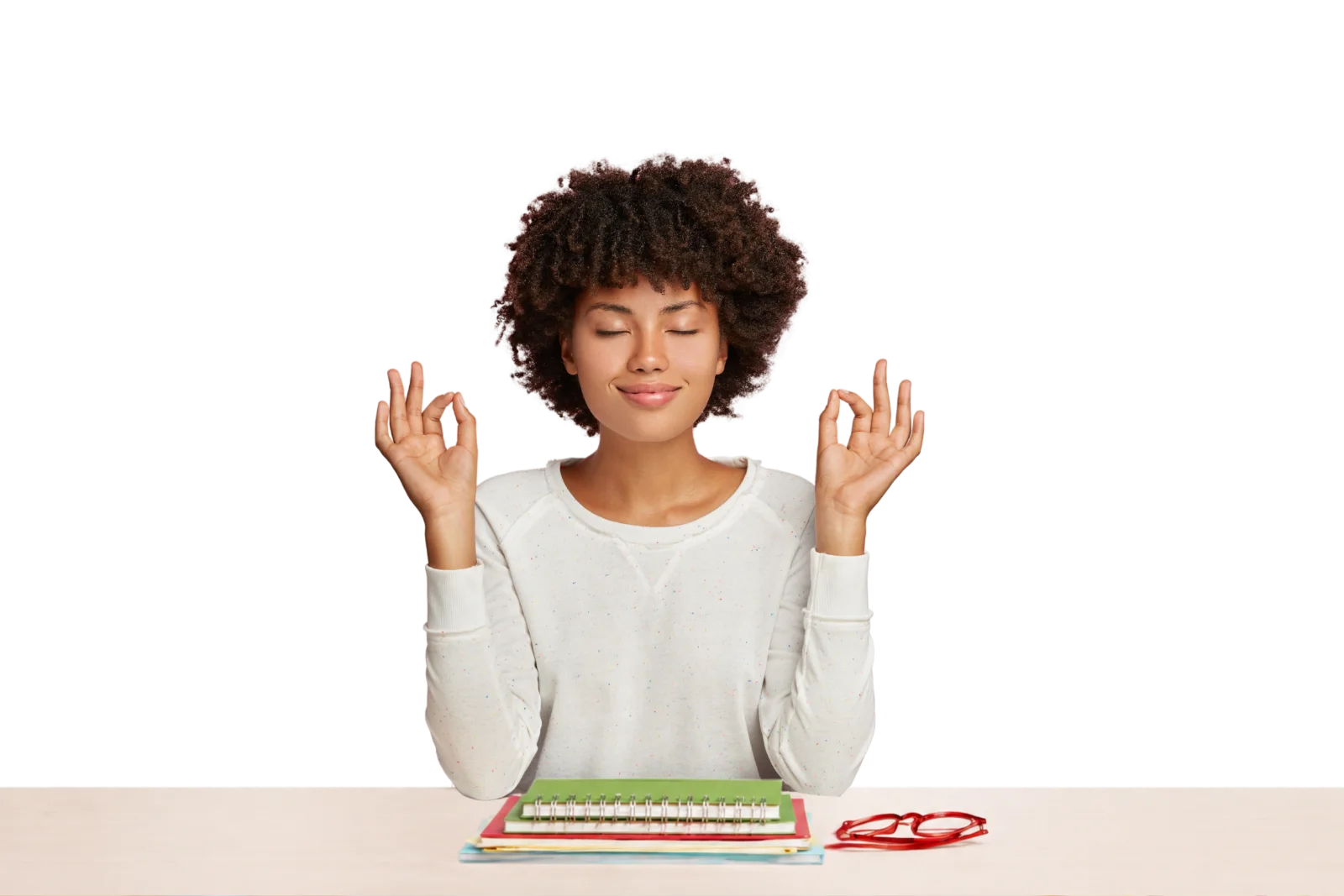 A board administrator meditating serenely behind a finished stack of notebooks